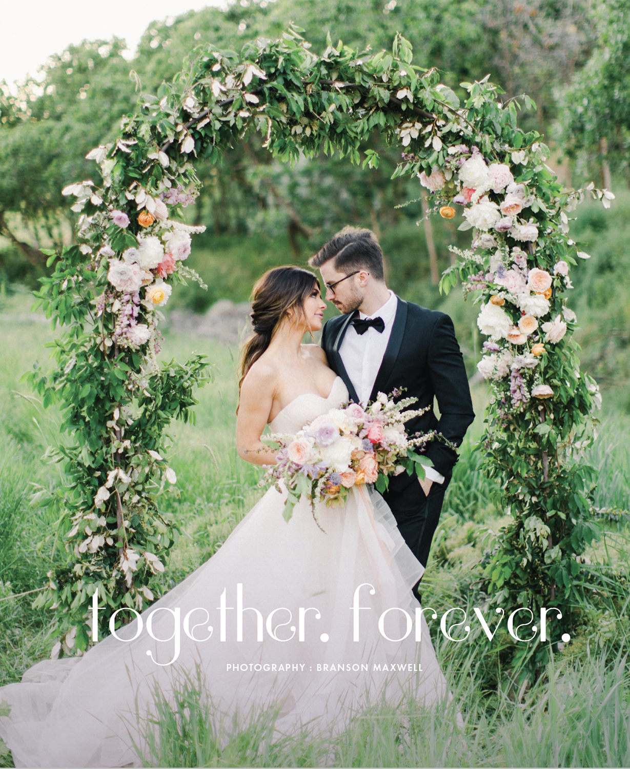 Together Forever features a gorgeous floral arch, a stunning tablescape and a beautiful couple in a romantic garden setting. Photography: Branson Maxwell 