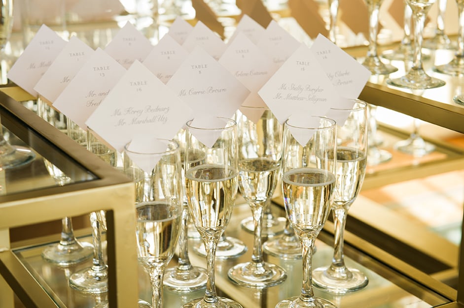 houston wedding, name cards, seating, table numbers, champagne