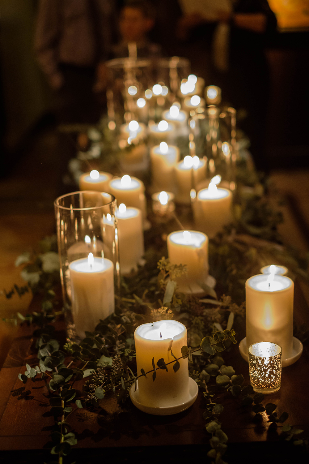 wedding reception decor - candles - greenery