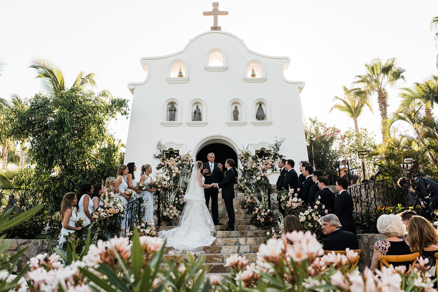 stucco, chapel wedding ceremony in mexico - flowers - blush, cream