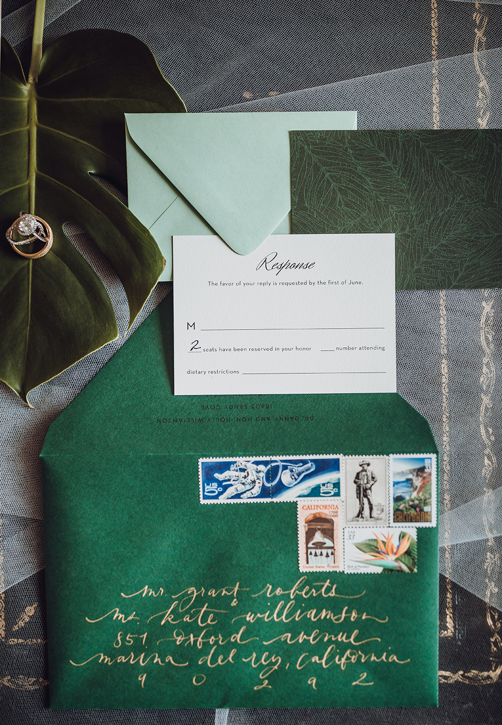 flat lay - stationary - invitations - green - tropical