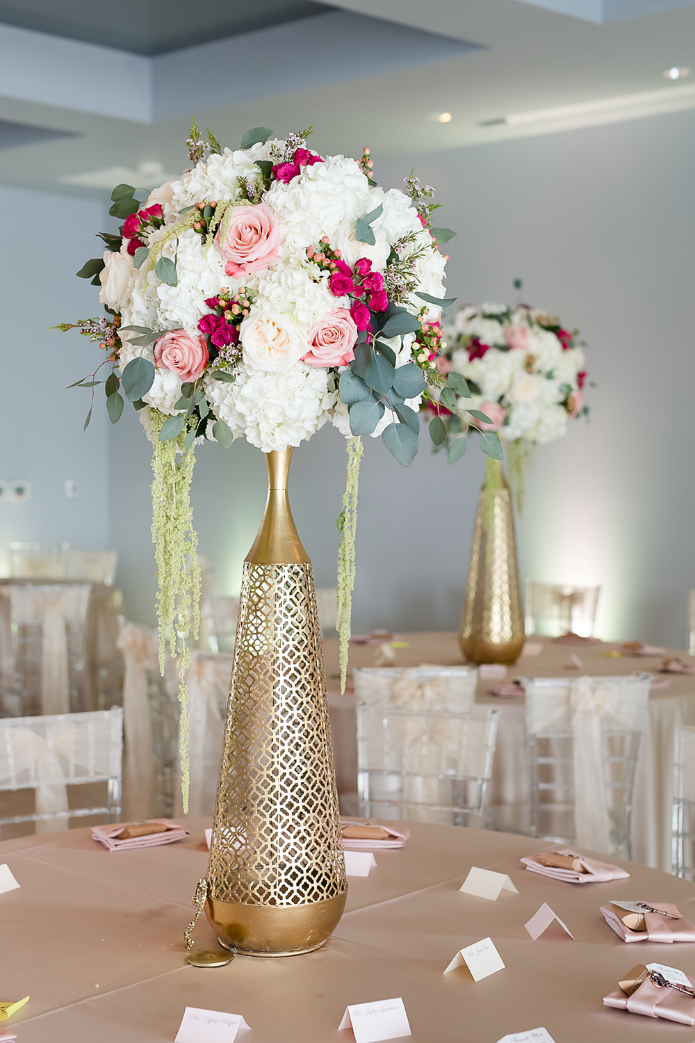 blush and gold reception decor for ballroom wedding