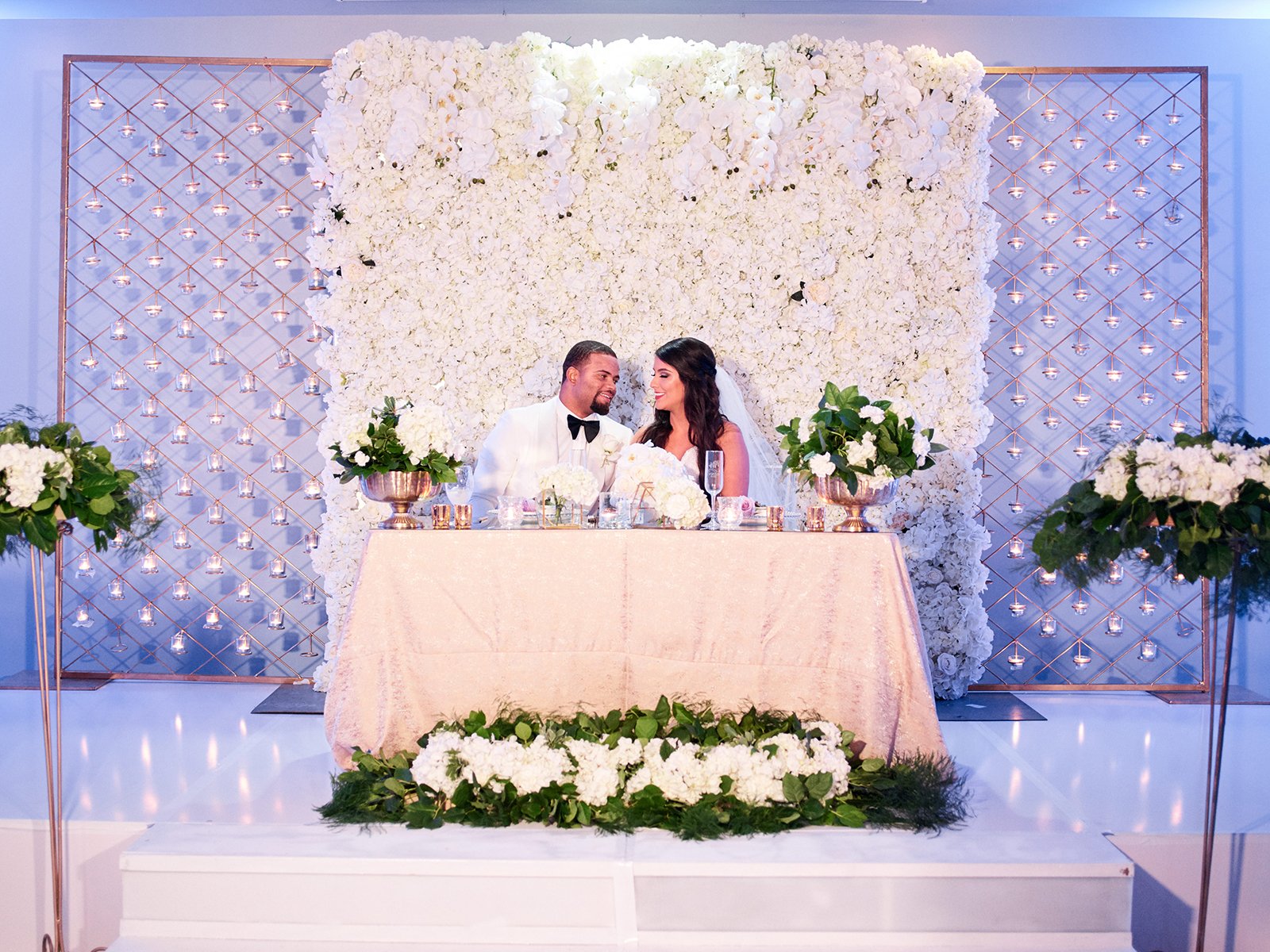 lavender, ivory wedding reception decor and lighting