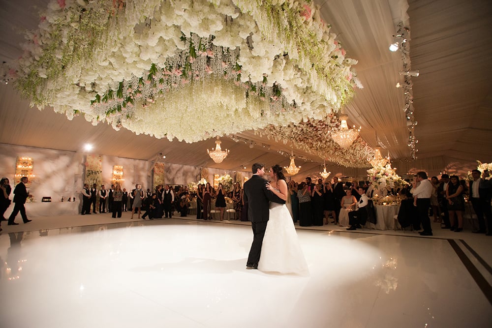 floral treatment above the dance floor for wedding reception 
