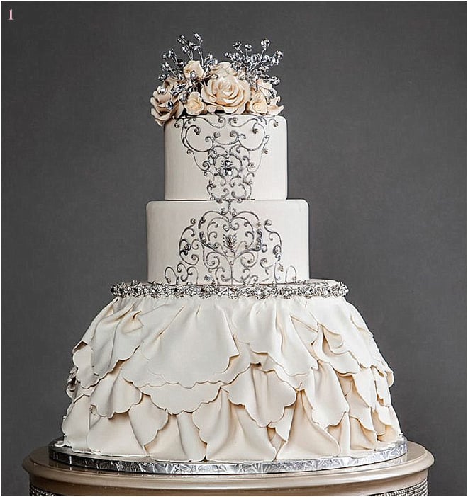 Cream Ruffled Wedding Cake with Flower and Jeweled Details 