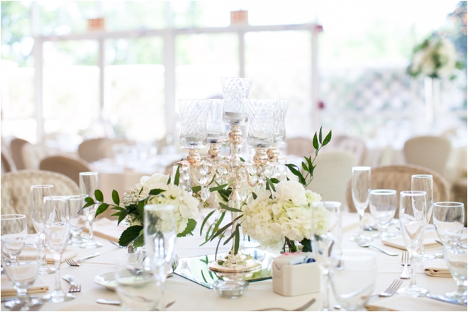 white greenery wedding reception table simple elegant centerpiece