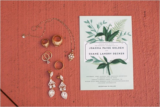 bridal jewelry wedding invitation flat lay orange green white 