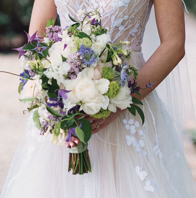 purple and white bridesmaid bouquets