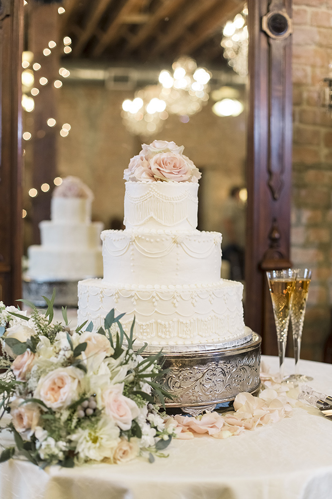 vintage haute flowers bridal bouquet white wedding cake pewter stand blush rose toppers butler's courtyard