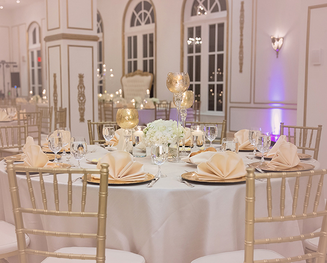houston wedding, chateau cocomar, white and gold decor, wedding reception, floral centerpiece with white flowers, wedding reception decor, luxe chateau cocomar wedding