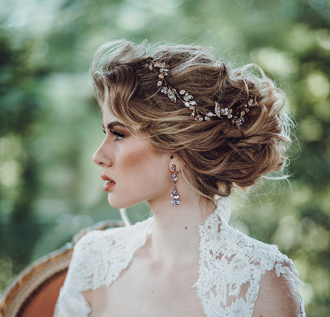 bridal hair and makeup wedding beauty houston stylists makeup artists textured updo curly hair low bun maria elena headpiece bridal hair accessory