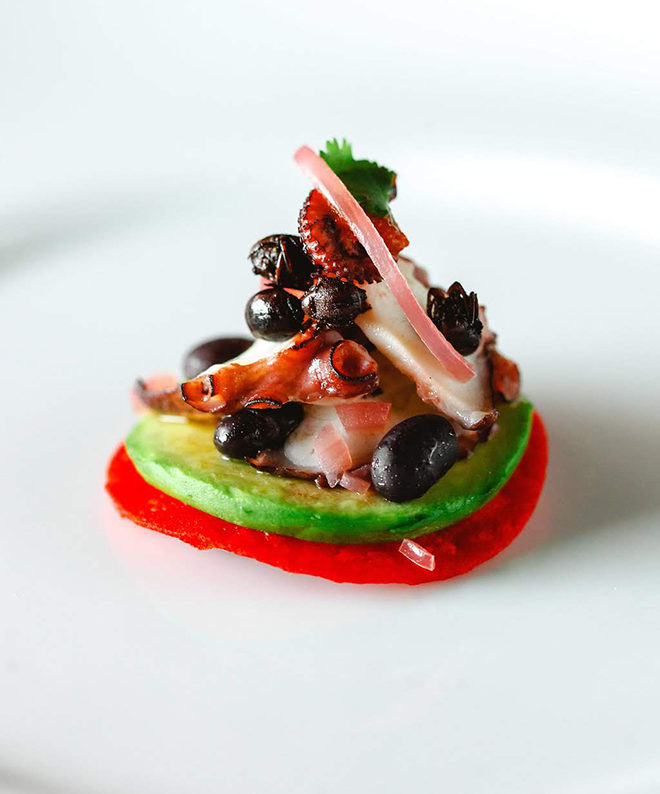 Braised Octopus appetzier with black bean puree by Armandos