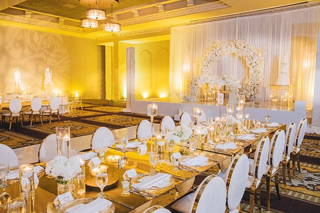 glamorous wedding, reception decor, wedding venue, real wedding, gold, white, ivory, bayou city events center, flowers, floral arch, his her table, elegant, luxury, royal