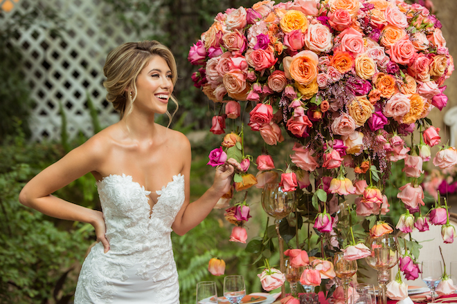 garden themed, styled shoot, wedding, vibrant, colorful, micro wedding, decor, reception, florals, flowers, venue, bridal, wedding gown, hair, makeup, red, orange, pink