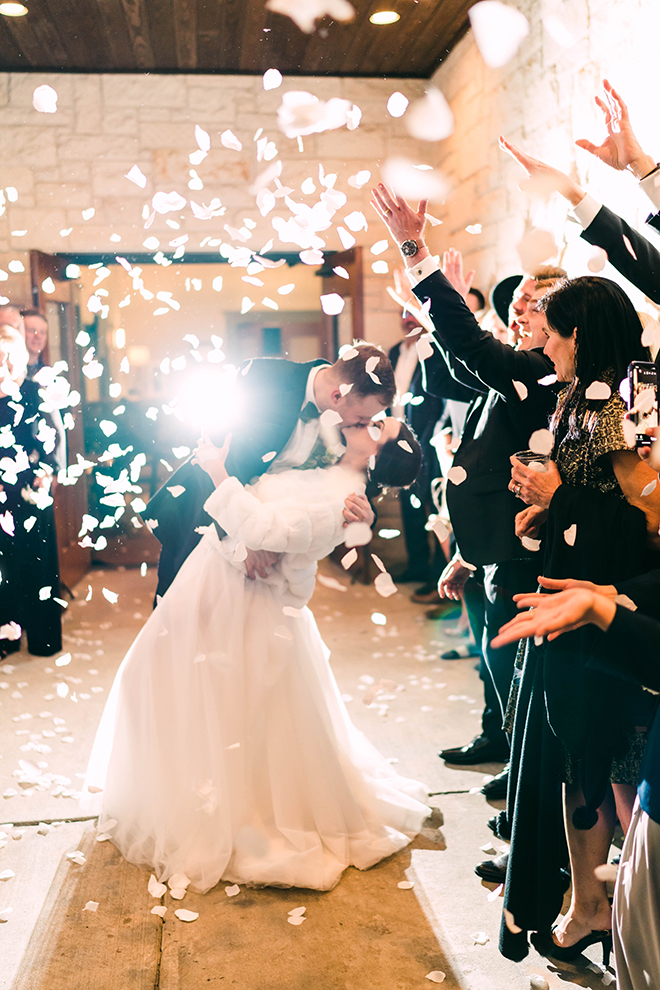 wedding, sendoff, grand exit, newlyweds, rose petal toss, white, ivory, fur coat