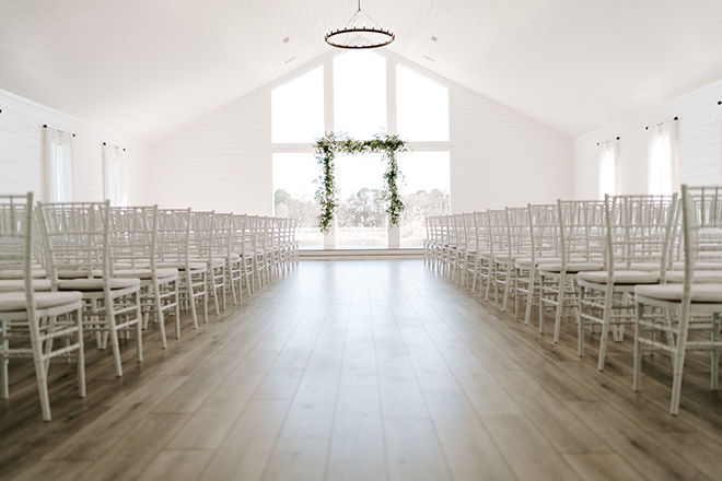 chic wedding, ceremony, decor, simple, greenery, arch, altar, indoor, emily figurelli photography, white