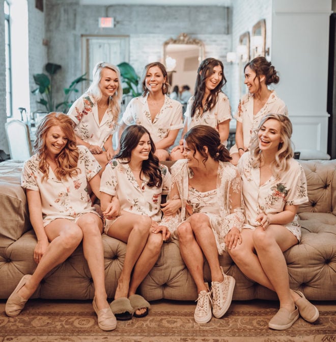 Pink robed Bridesmaids and bride in luxury Soho bridal Suite at The Astorian 