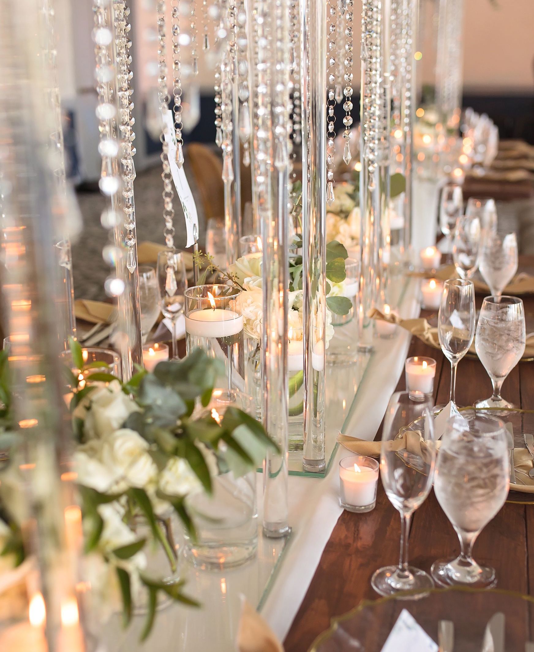 Crystal beads suspending from the table wedding centerpieces.