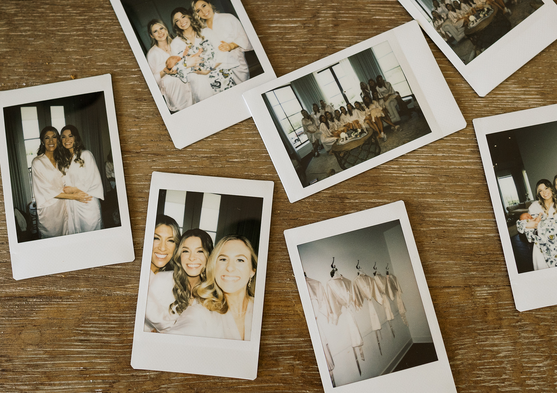 Polaroid photos of the bride and her bridesmaids before their timeless wedding.