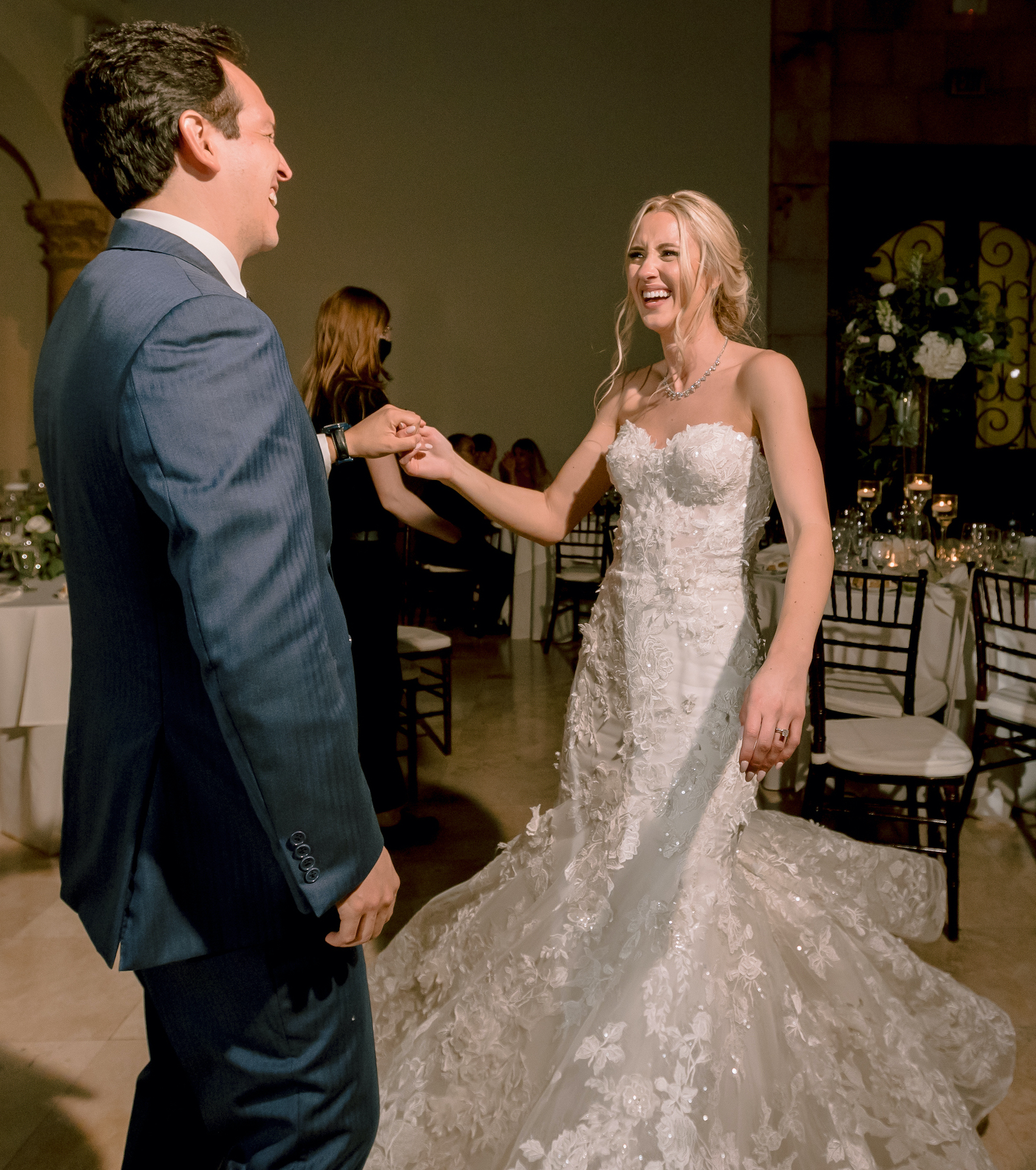 The bride and groom dancing at their wedding reception.