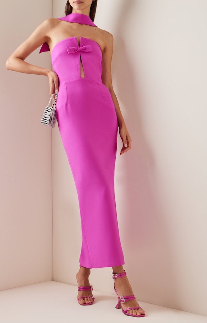 Hot pink maxi dress with a bow across the front.