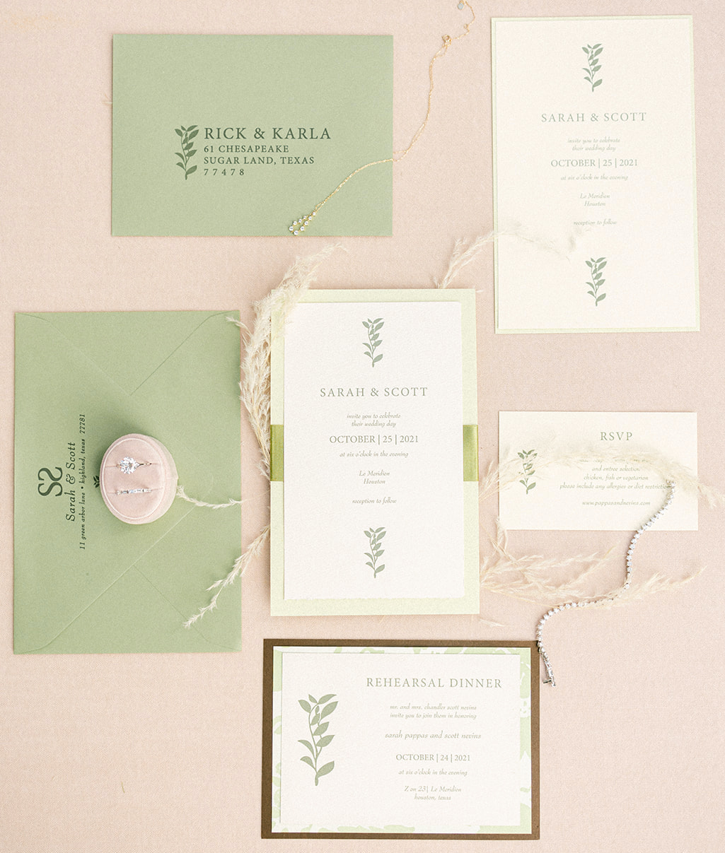 A flat lay in pink and green for the ethereal rooftop wedding styled shoot.