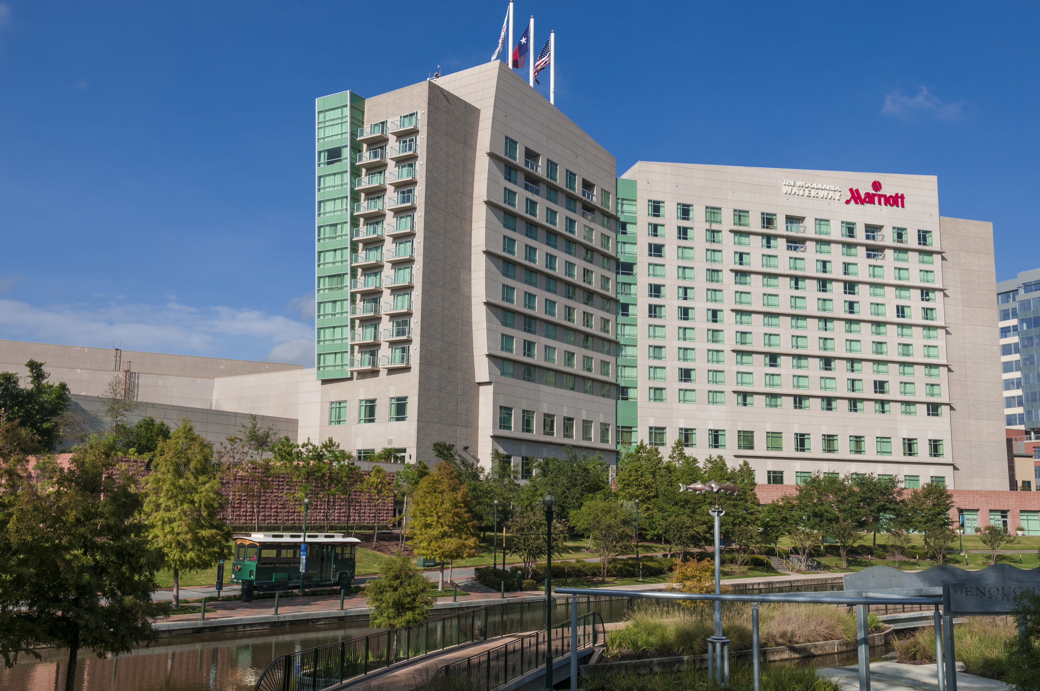 Exterior of The Woodlands Waterway Marriott Hotel from the back, overlooking the Waterway water canal. 