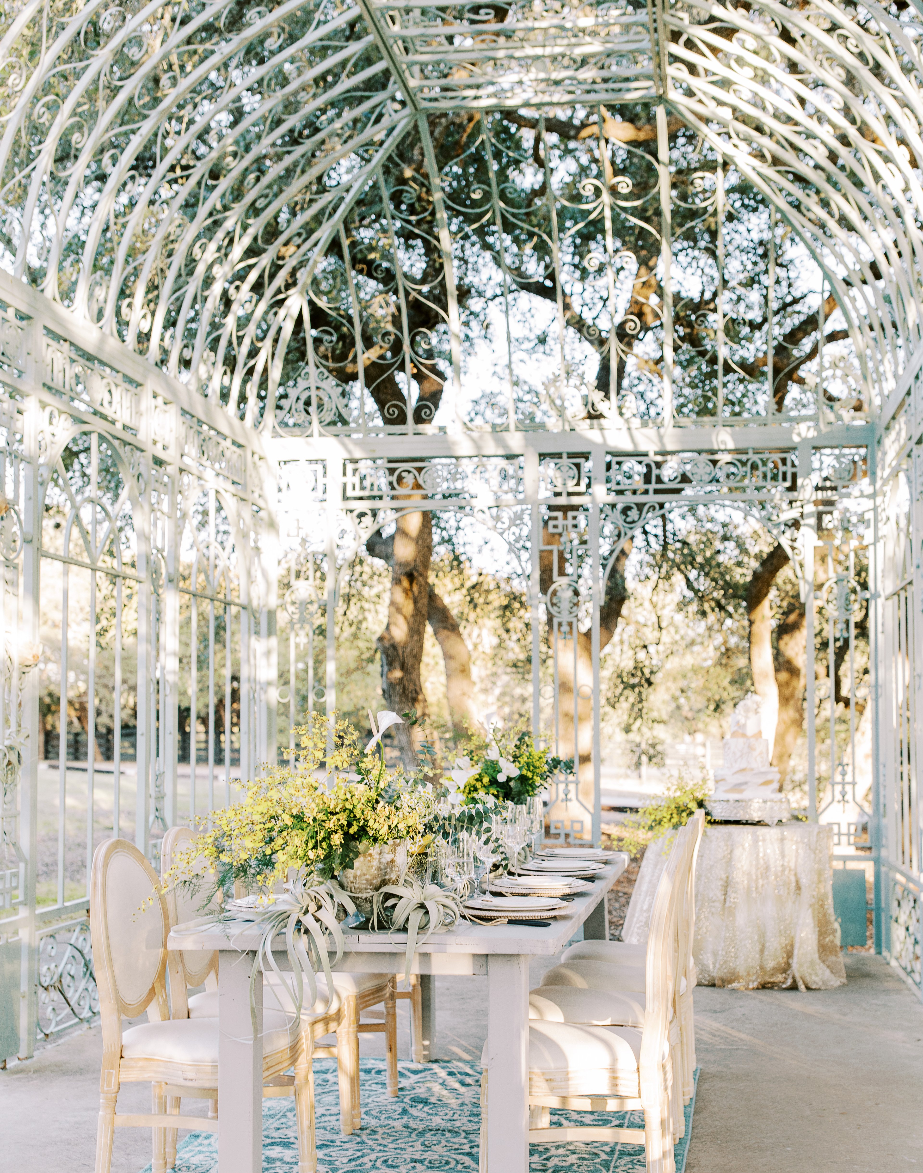 An outdoor vintage greenhouse at The Ma Maison in the Texas Hill Country.