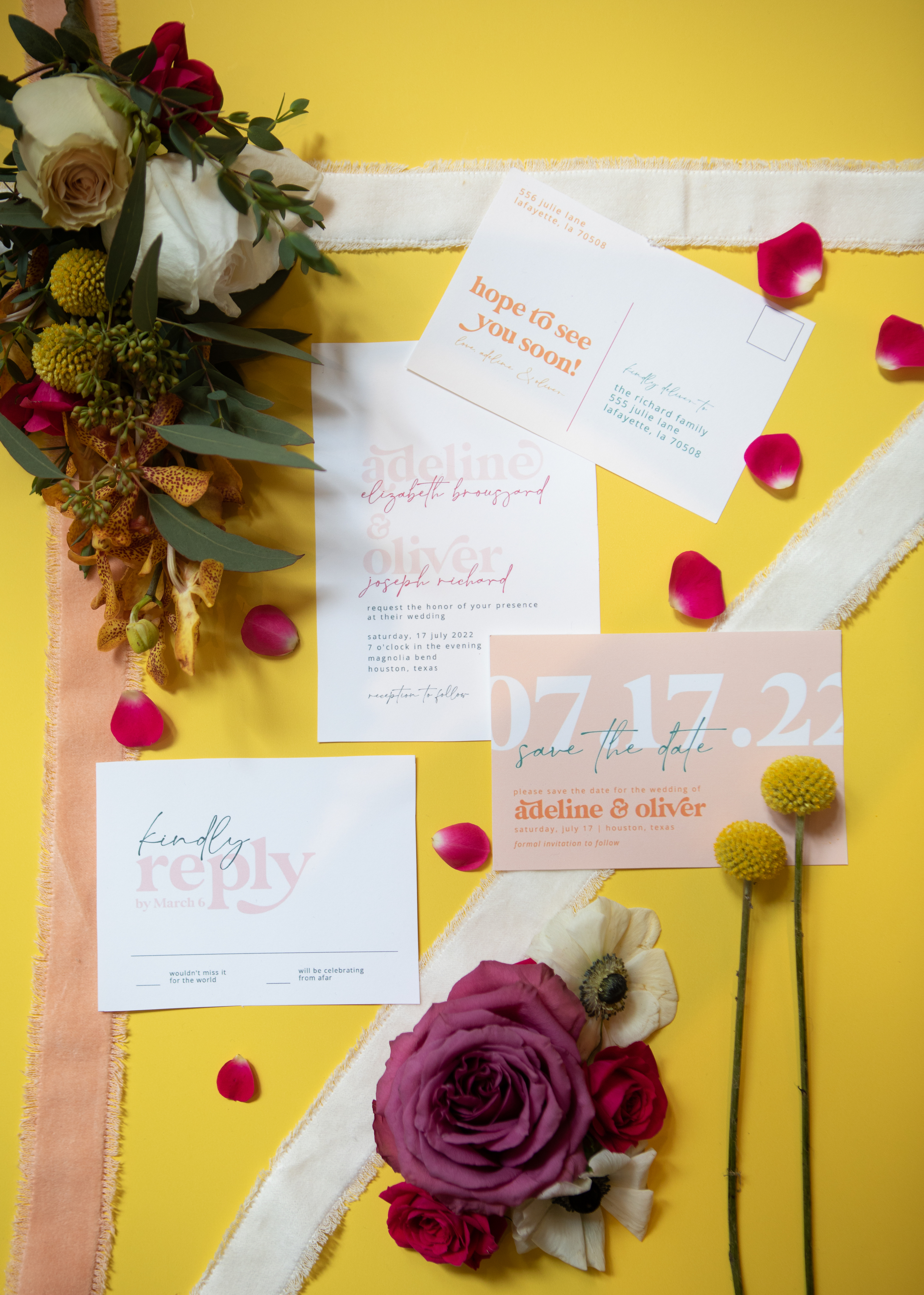A flat lay of florals, ribbons and invitation suite for a vibrant retro-inspired styled shoot at The White Hall in Houston, TX.