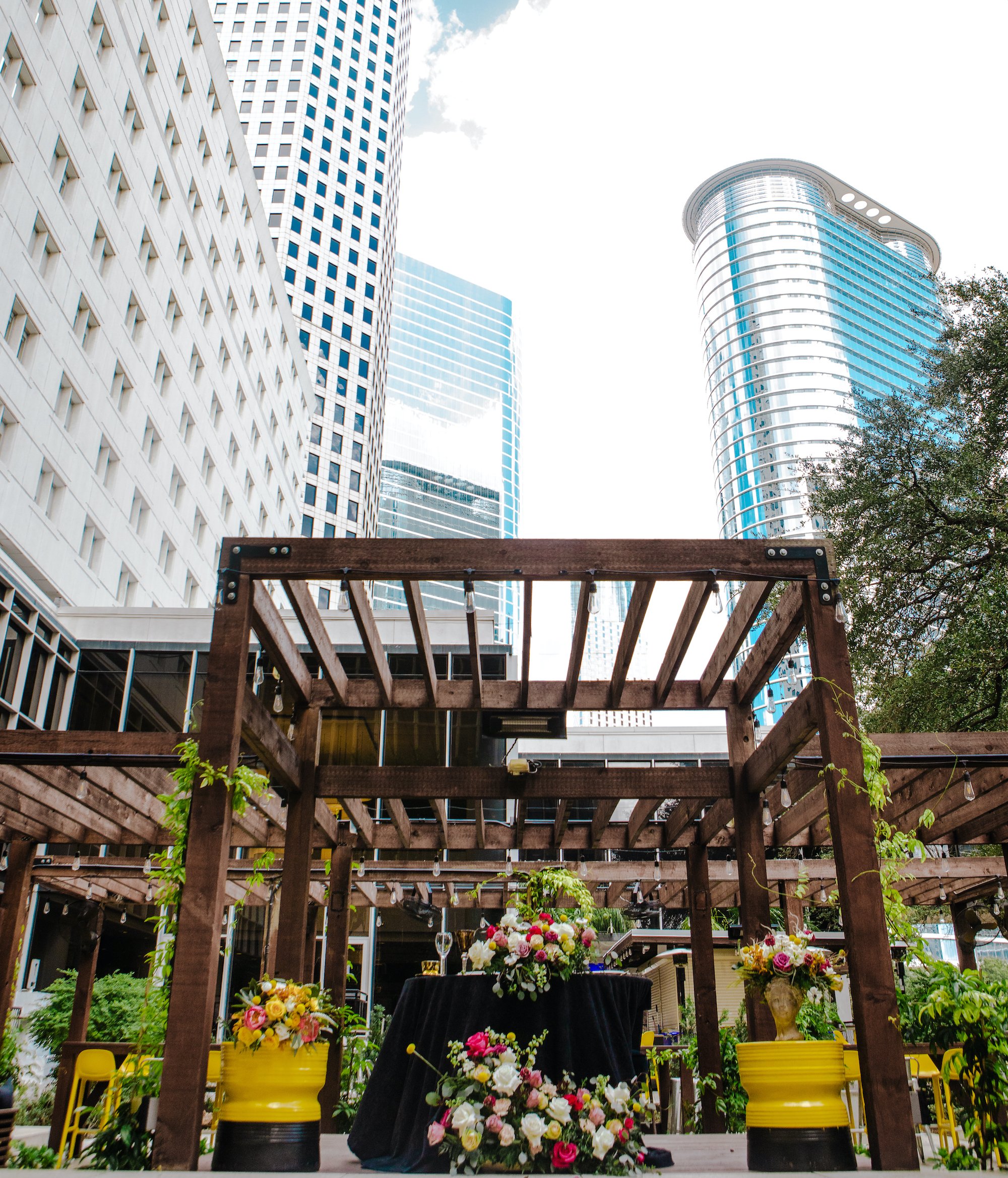 An outdoor wedding set up at The Whitehall in Houston, TX which is a hotel wedding venue.