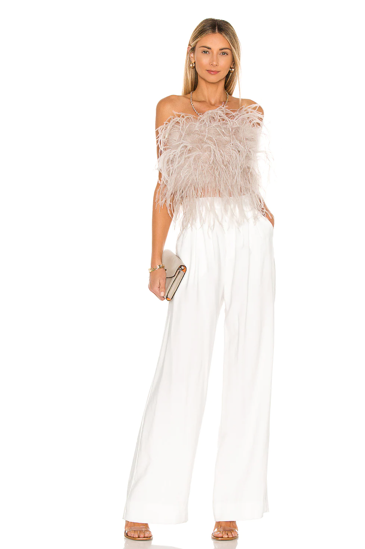 A strapless beige feathery top with white trousers, a great bridal shower look for brides from REVOLVE