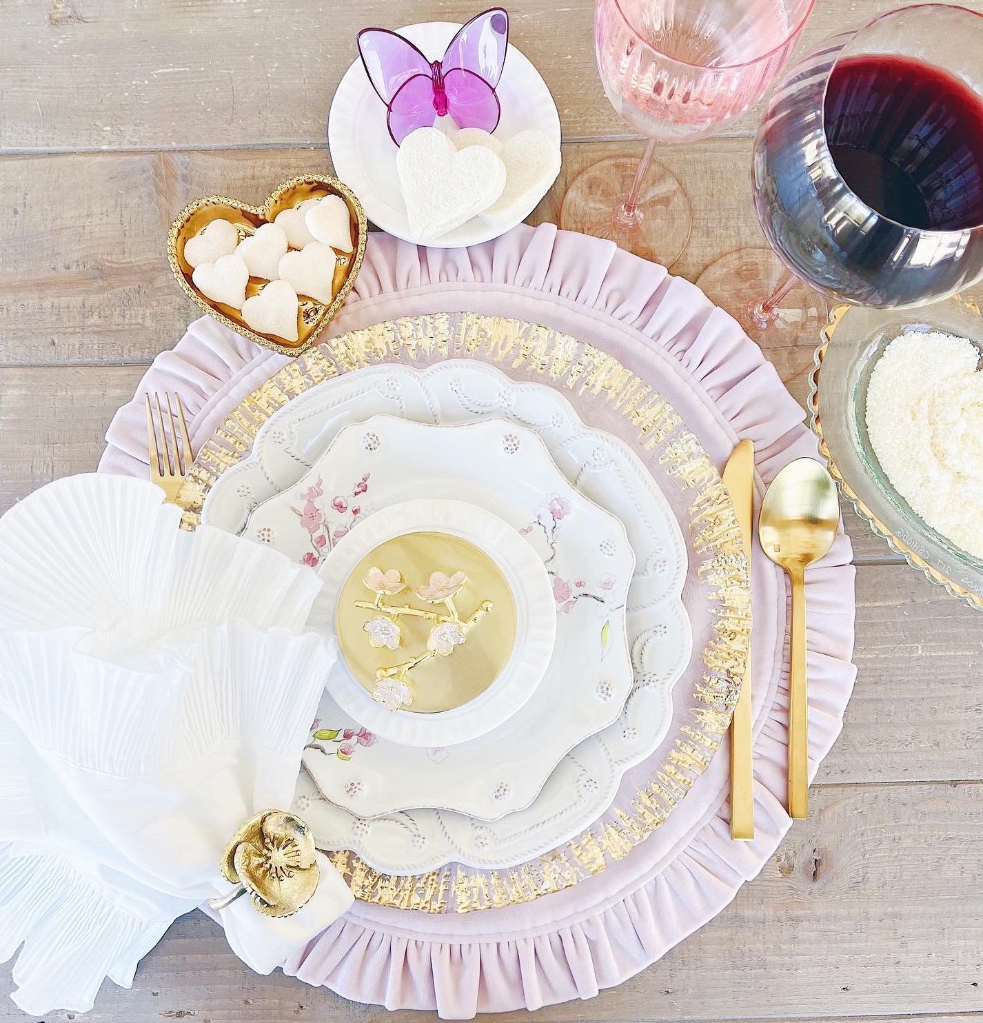 A light purple and white table setting from Bering's in Houston, TX that is Valentine's Day themed.