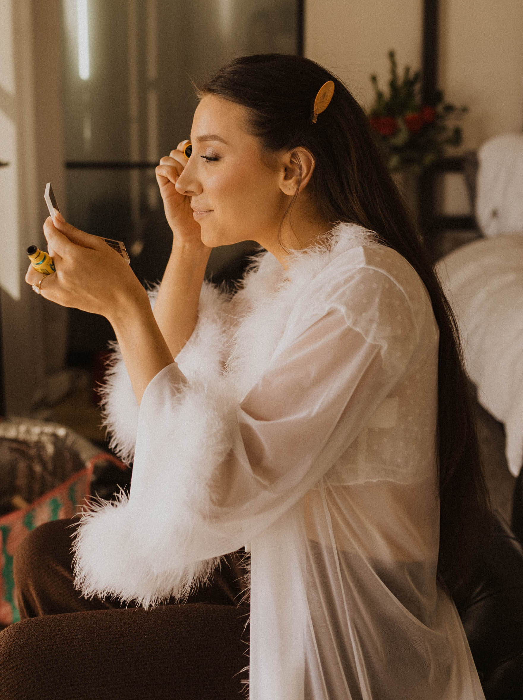 Caked Up With Riley does her bridal hair and makeup for her destination elopement.