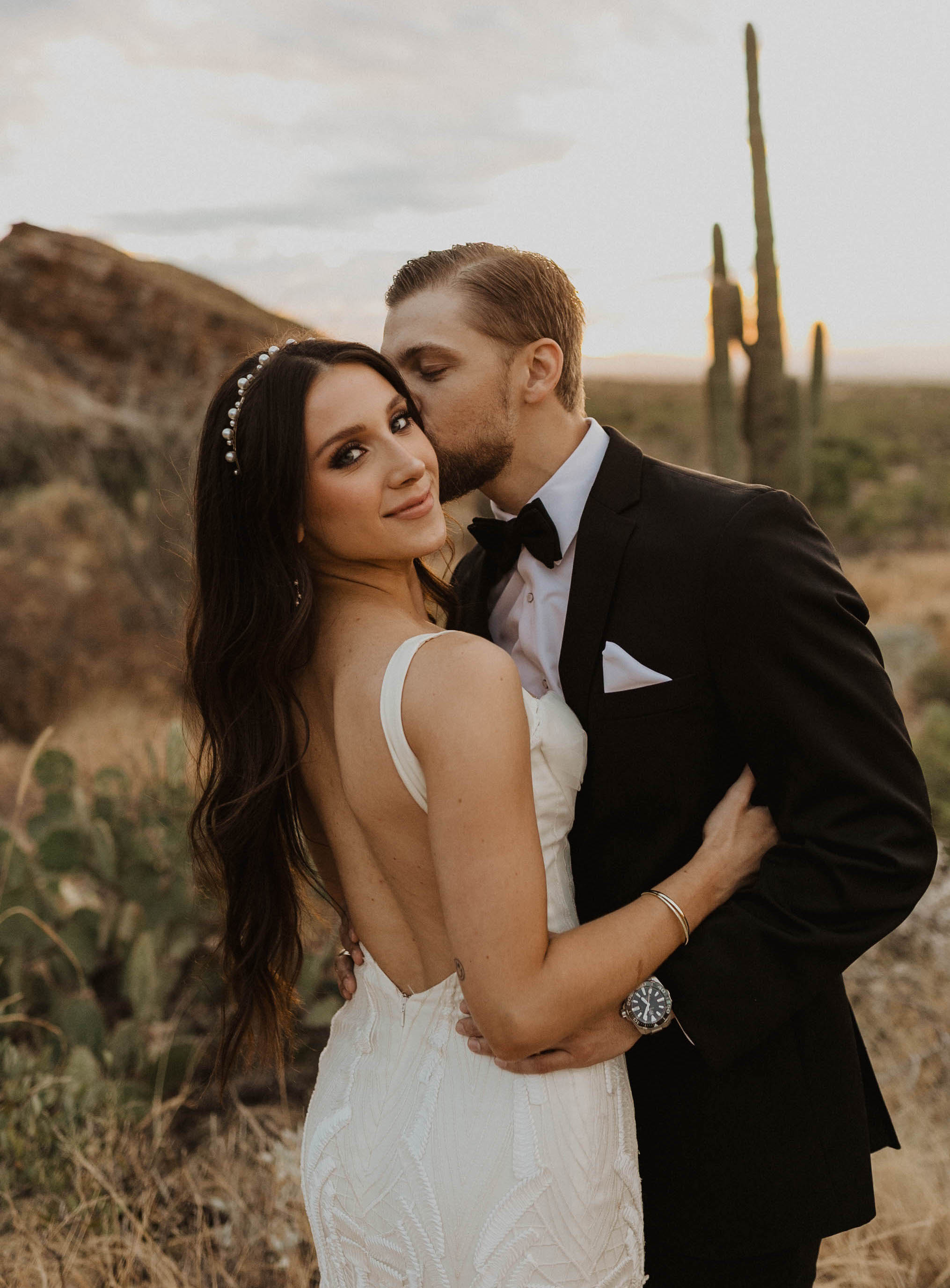 A bride (Caked Up With Riley) and groom in Saguaro National Park, Arizona.