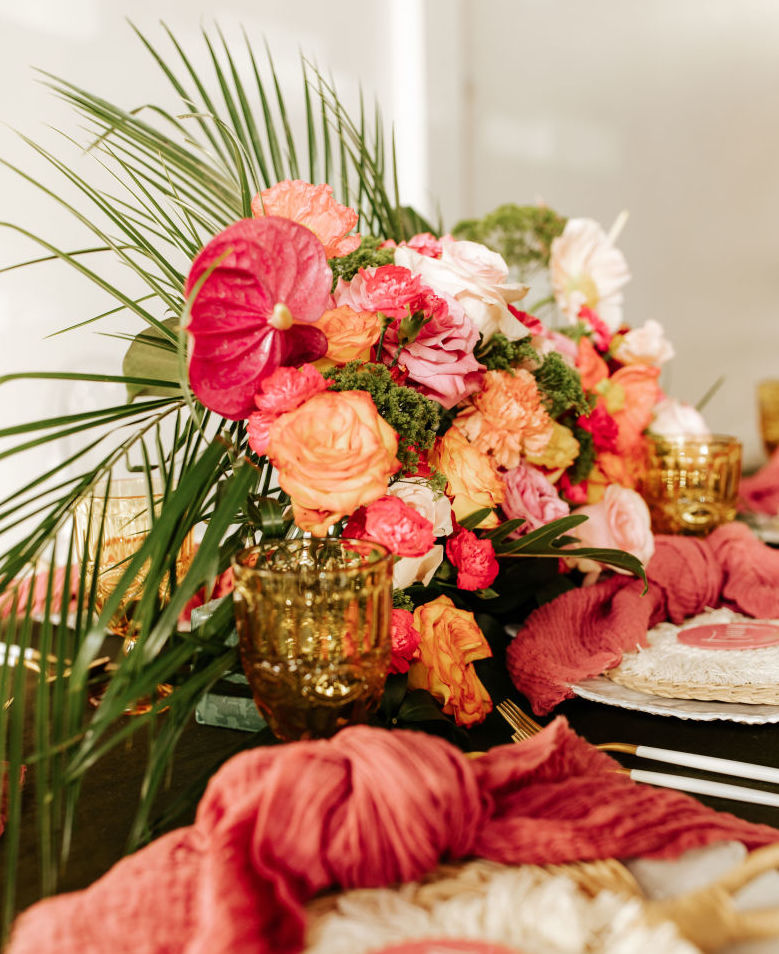 Hot pink, coral and orange wedding flowers for a tropical havana wedding styled shoot.