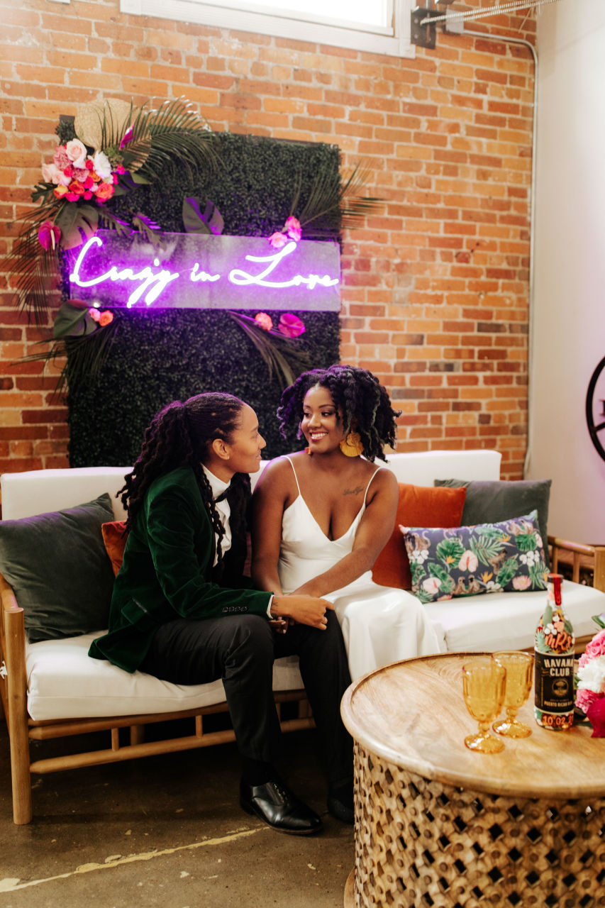 Tropical Havana wedding inspiration for a styled shoot in Houston, TX with a neon sign.