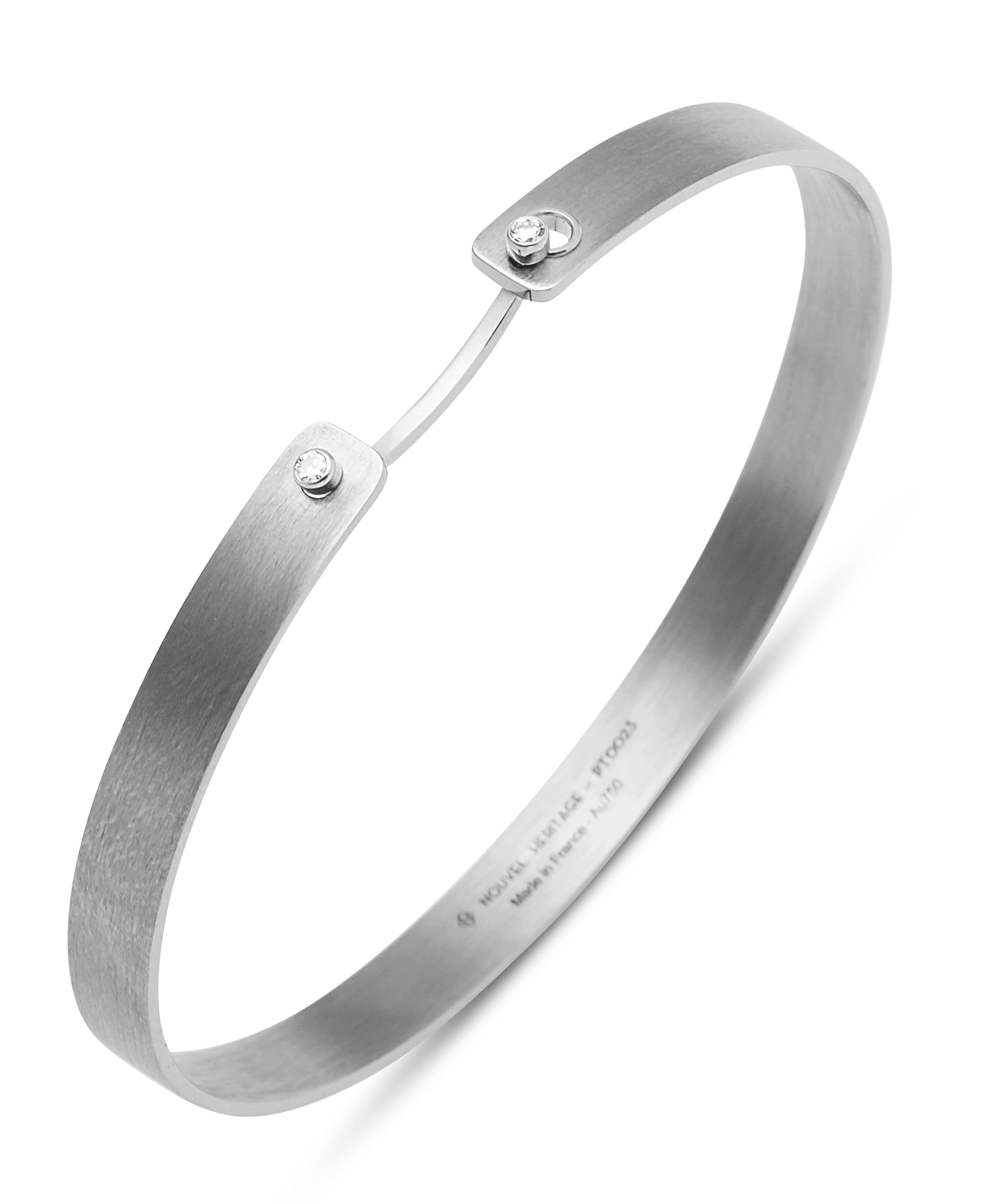 Titanium bangle for the groom available at Zadok's, a jeweler in Houston, TX.