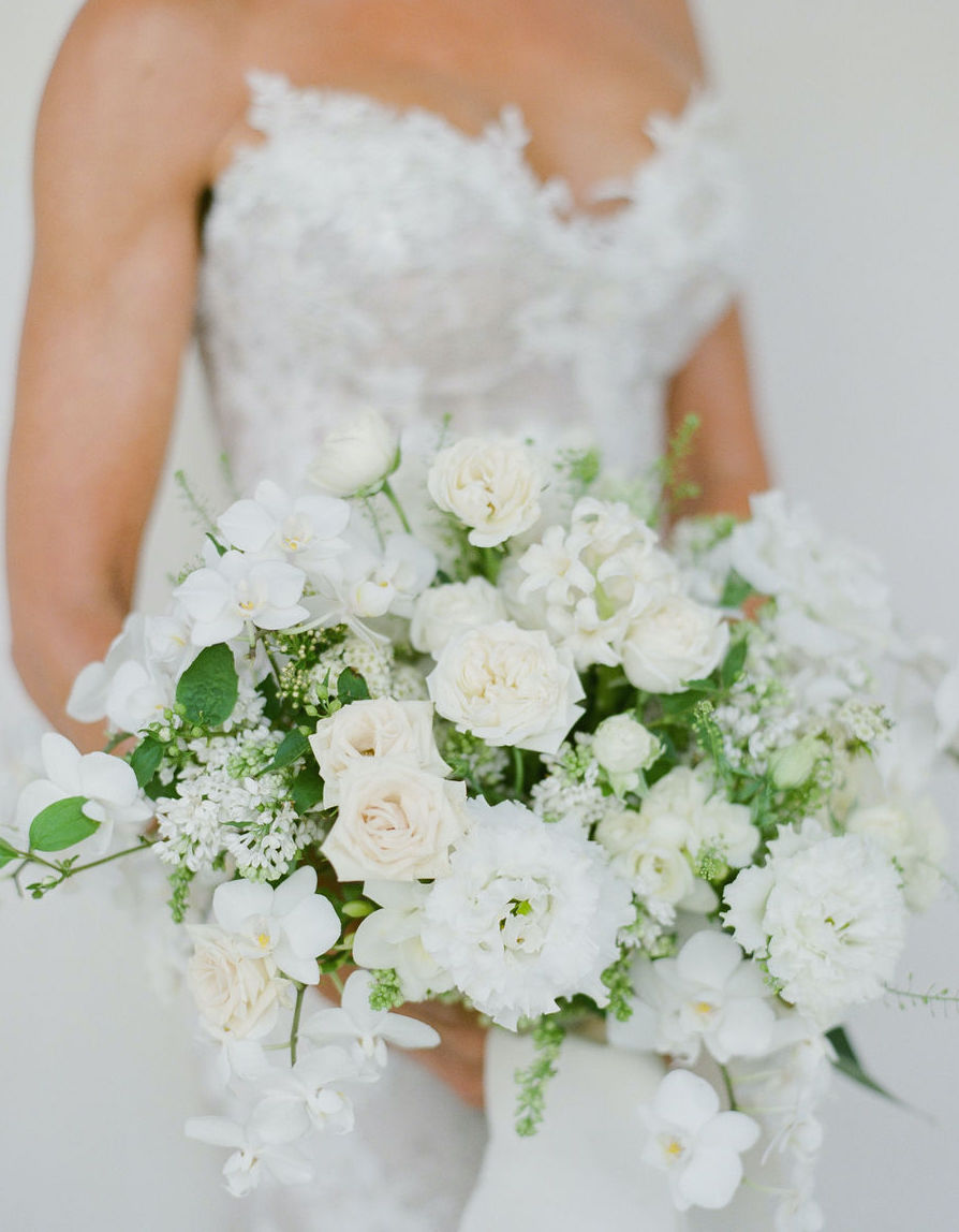 An all white bridal bouquet with white flowers for an alfresco wedding in the Lowcountry.