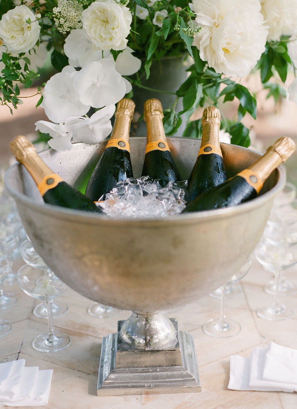 A bucket of Veuve Cliquot champagne for an alfresco wedding in the Lowcountry.