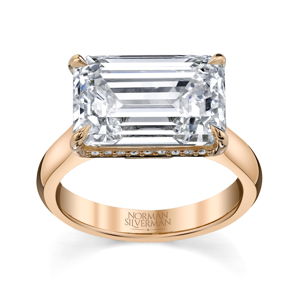 Emerald cut diamond ring with rose gold band from California jeweler, Norman Silverman.