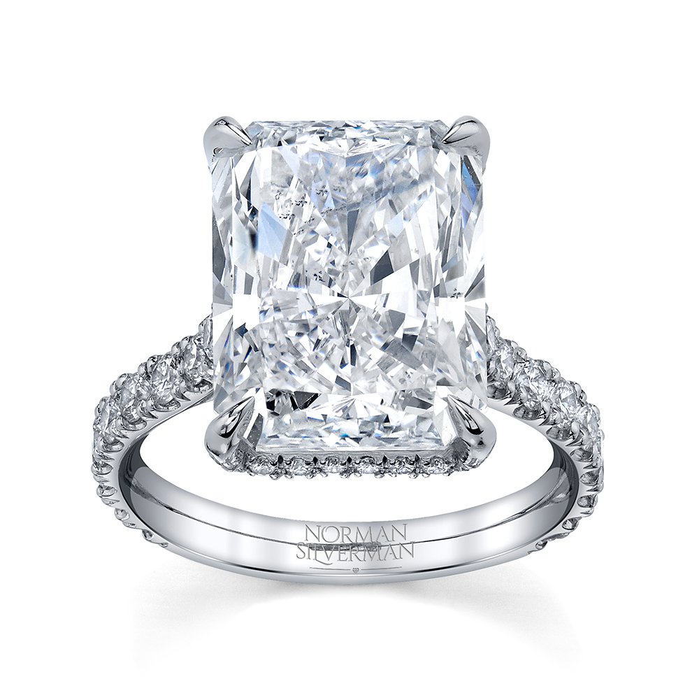 Square cut engagement ring with a pave diamond band from Norman Silverman.