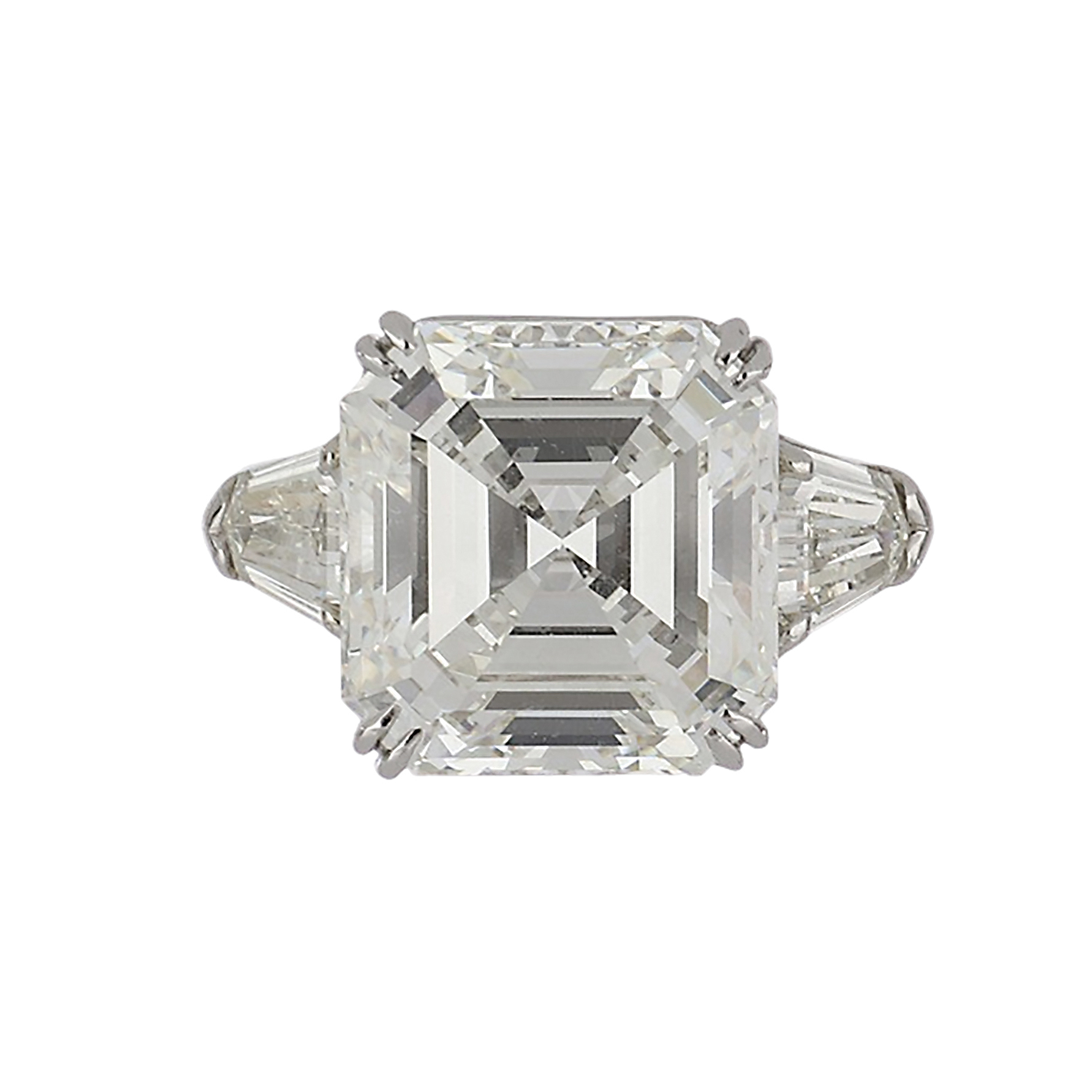 A square emerald-cut engagement ring from luxury jeweler, Tenenbaum Jewelers in Houston, TX.