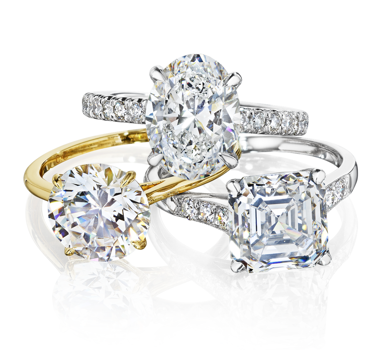 Three diamond engagement rings from luxury jeweler, Zadok Jewelers in Houston, TX.