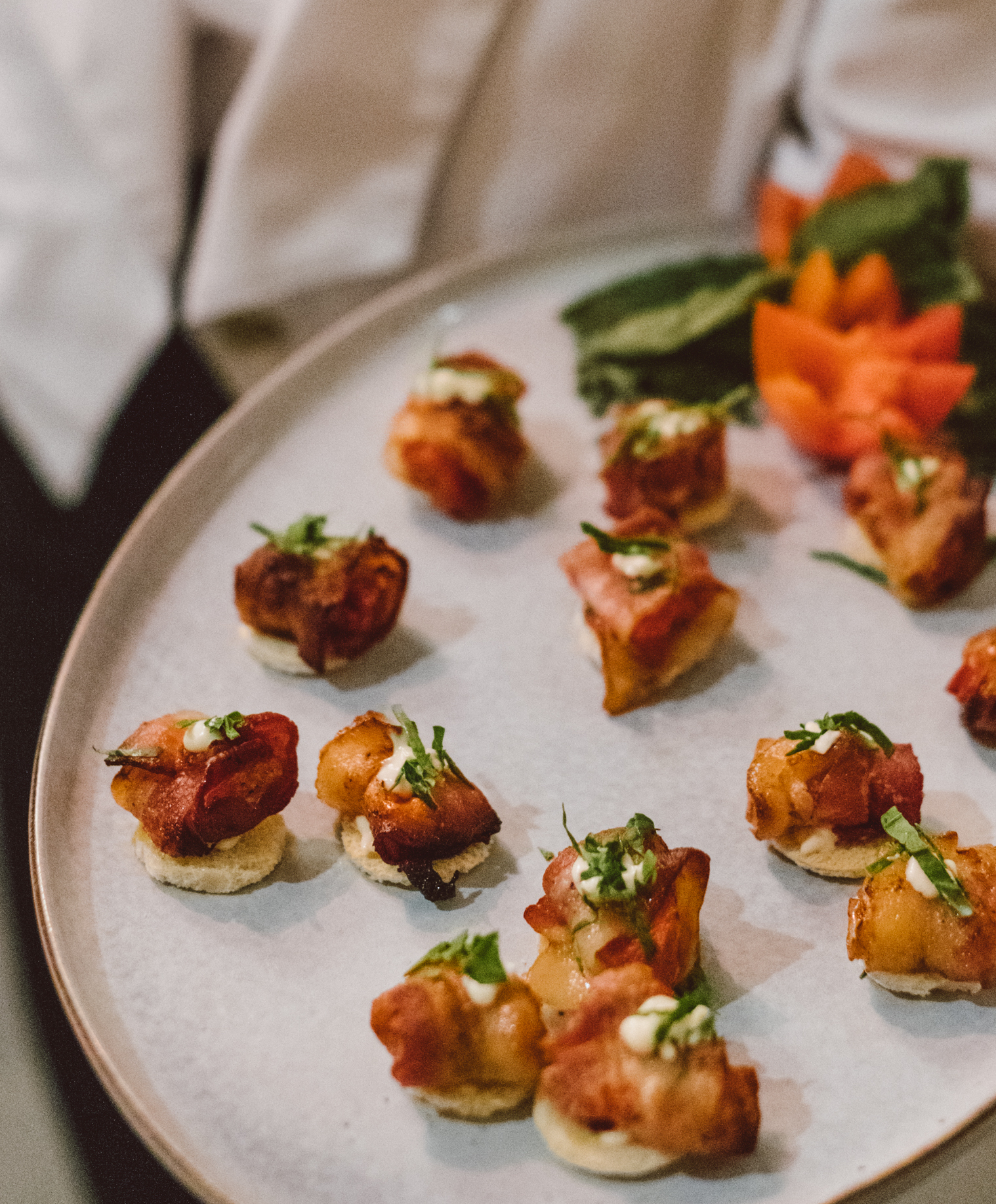 Little appetizers are being served during a cocktail hour at a winter wedding in Houston.