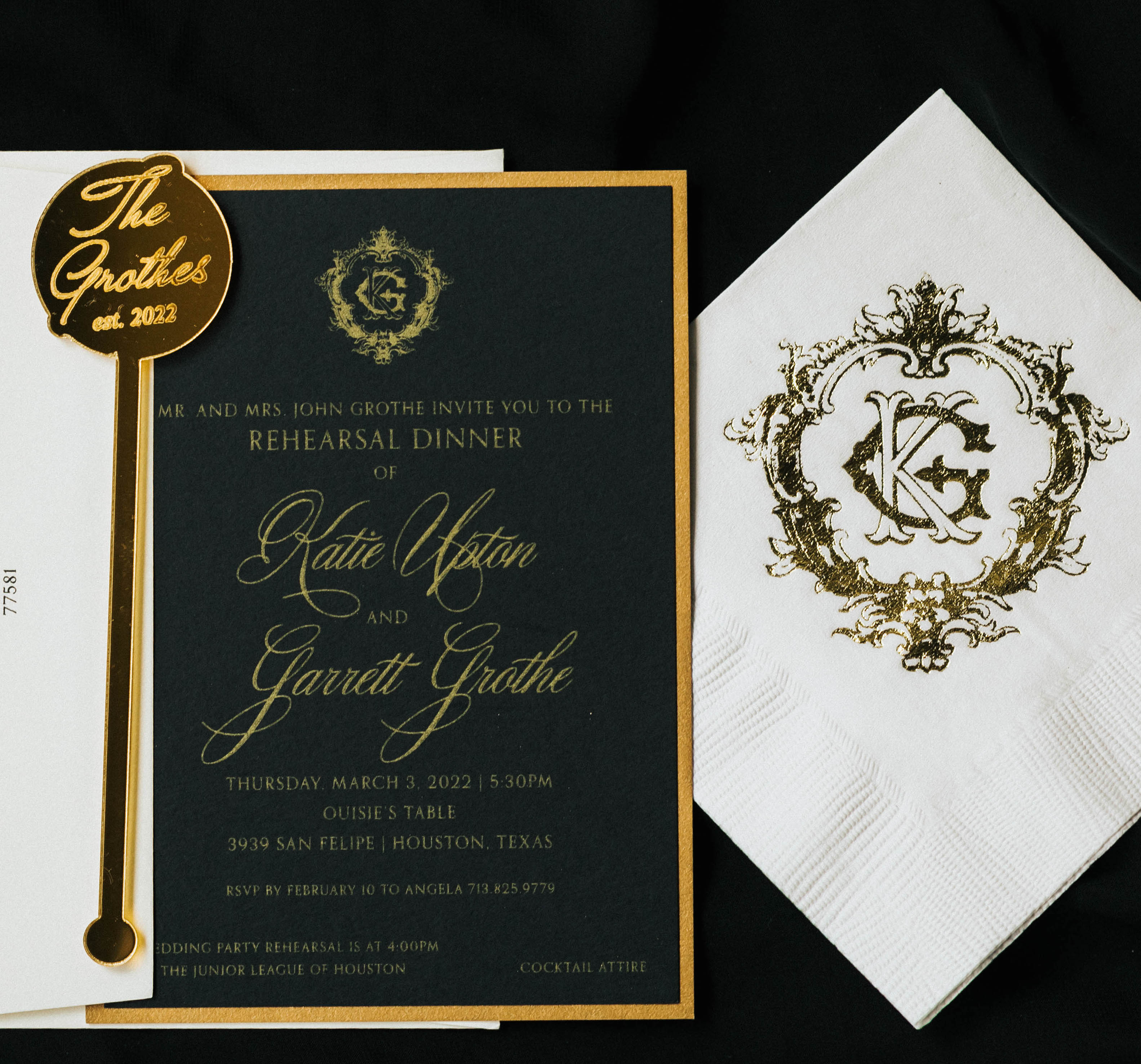A black, white and gold wedding invitation suite for a bride and groom.