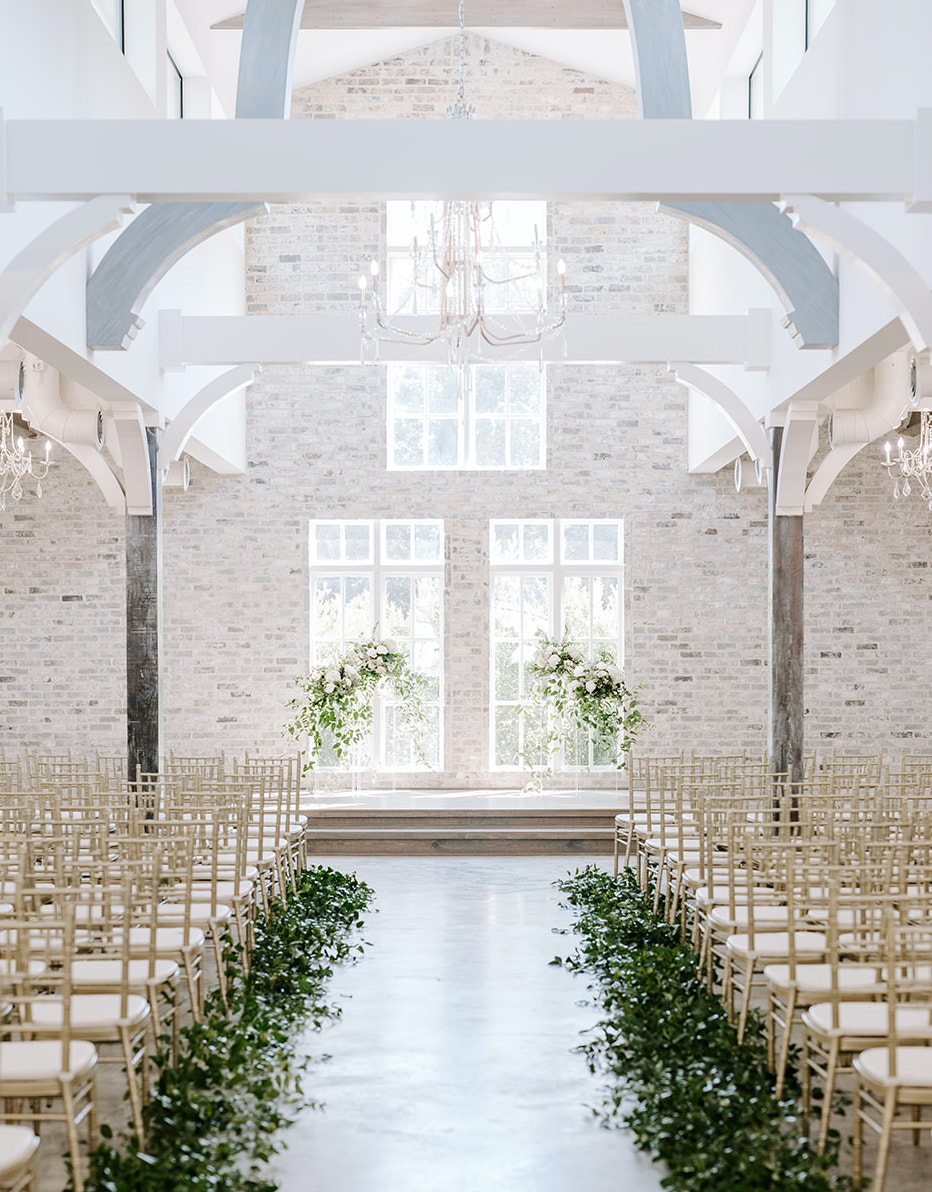 A bright white chapel in The Woodlands, TX called The Peach Orchard. Texas Wedding Venues With On-Site Chapels