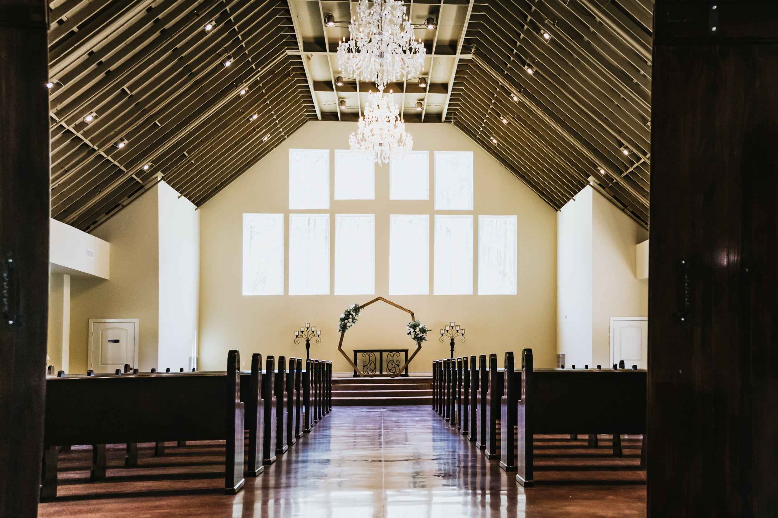 The inside of a wedding chapel at a secluded luxury venue called The Hundred Oaks Event Center.