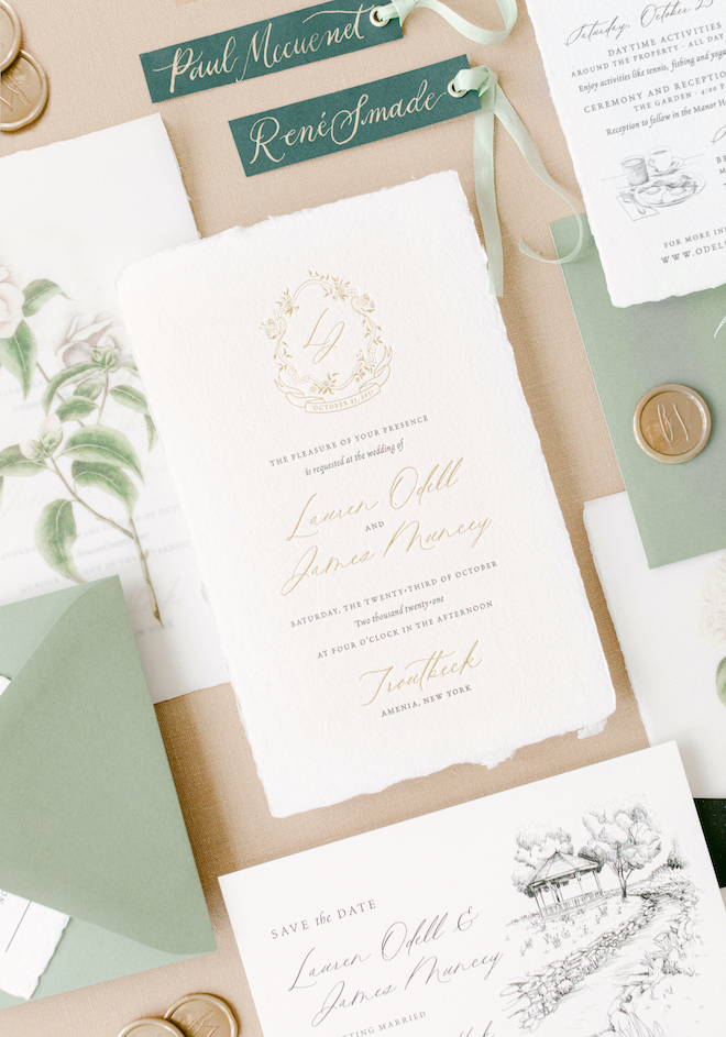hand painted letterpress invitation suite with gold wax seals, gold calligraphy and letterpress wedding invitation by stationery studio, Crane & Palette. 