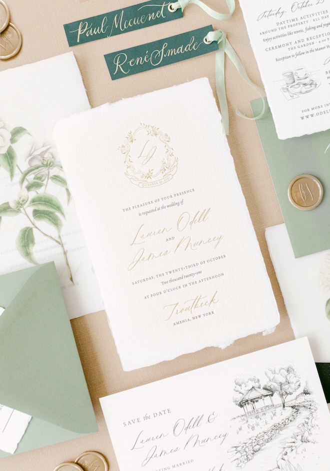 hand painted letterpress invitation suite with gold wax seals, gold calligraphy and letterpress wedding invitation by stationery studio, Crane & Palette.