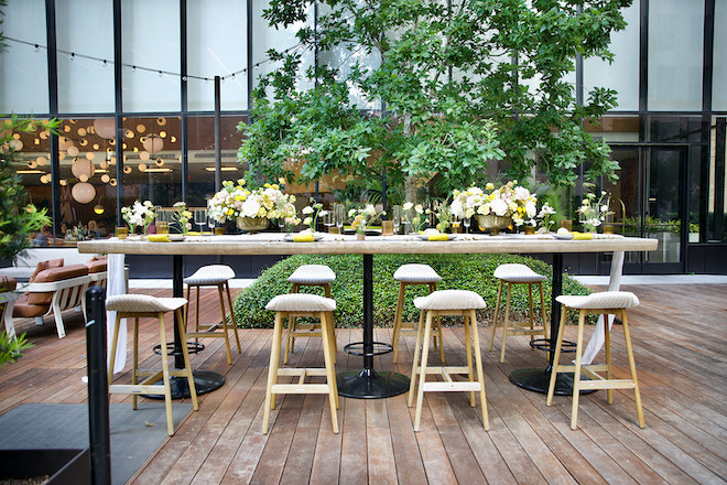 The outdoor tablescape with barstools for the modern minimalist wedding editorial.